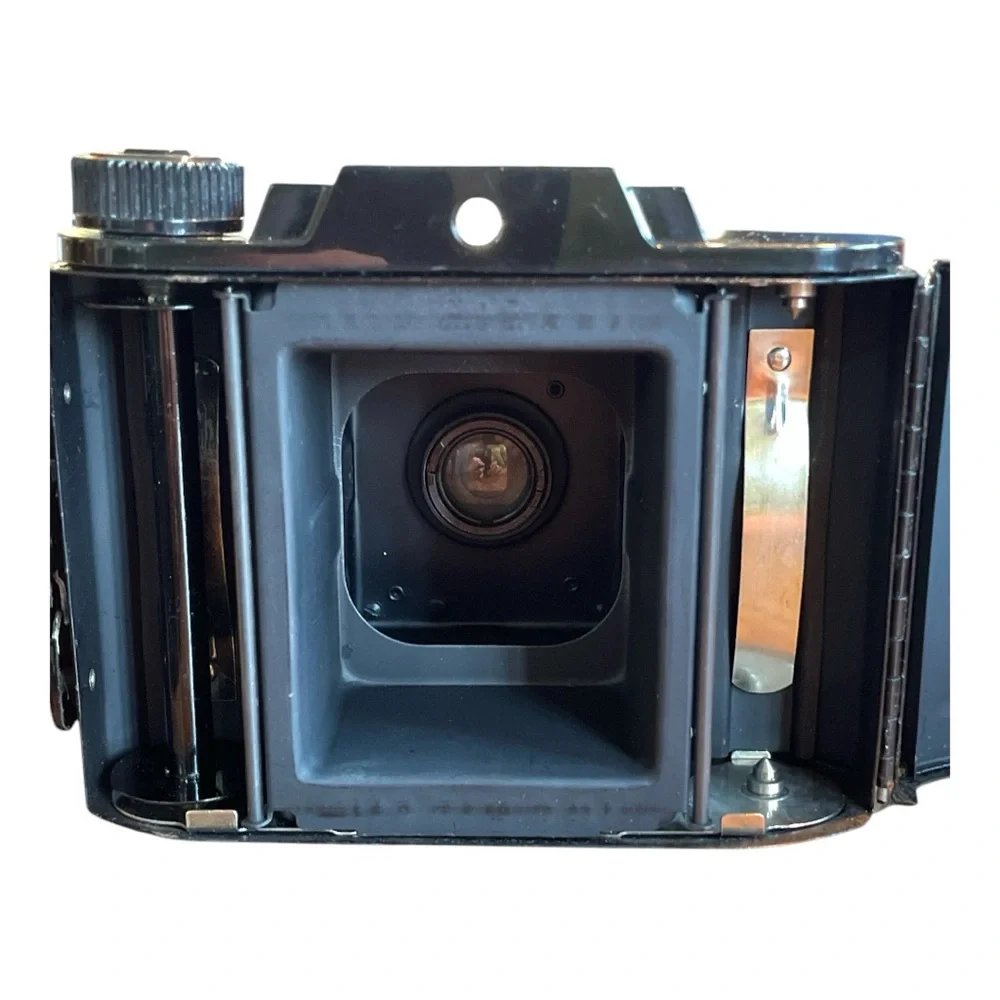 Black Film Photography Camera with Textured Body and Circular Lens UNTESTED